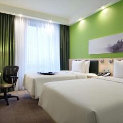 Гостиница Hampton by Hilton Minsk City Center комната для гостей фото 3