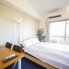 Апартаменты Hakata Apartment Хаката комната для гостей фото 5