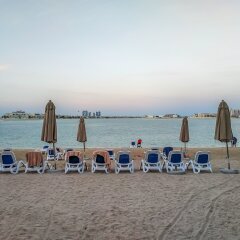 Отель Maison Privee - Grandeur Residence пляж
