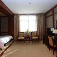 Отель Sunjoy Inn комната для гостей