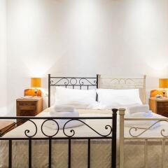 Апартаменты Santa Croce Apartment Флоренция комната для гостей фото 4