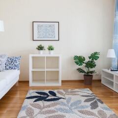 Апартаменты Kotimaailma Apartments Joensuu Йоенсуу комната для гостей фото 4
