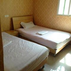 Отель Xiamen Yiqing Apartment Китай, Сямынь - отзывы, цены и фото номеров - забронировать отель Xiamen Yiqing Apartment онлайн комната для гостей фото 5