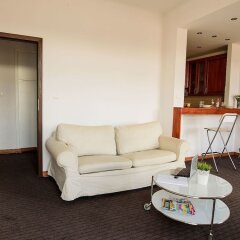 Апартаменты Downtown Apartments комната для гостей фото 4