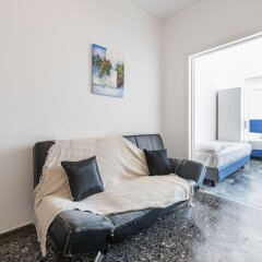 Апартаменты Sunsetia Apartment комната для гостей фото 4