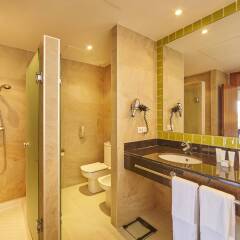 Отель Blau Privilege Porto Petro Beach Resort & Spa ванная фото 2