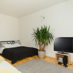 Отель Lucka Rooms - California Dreaming B24.2 Польша, Варшава - отзывы, цены и фото номеров - забронировать отель Lucka Rooms - California Dreaming B24.2 онлайн комната для гостей