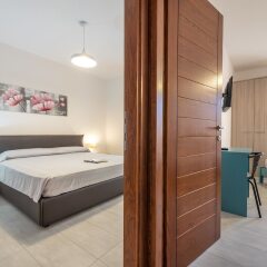 Отель AffittaSardegna - Lido Apartments Италия, Альгеро - отзывы, цены и фото номеров - забронировать отель AffittaSardegna - Lido Apartments онлайн комната для гостей