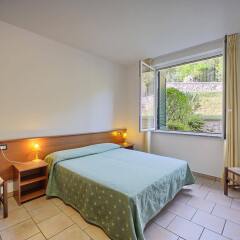 Отель Residence Isolino Италия, Вербания - отзывы, цены и фото номеров - забронировать отель Residence Isolino онлайн комната для гостей фото 2