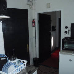 Отель Gustav Bed & Kitchenette в номере