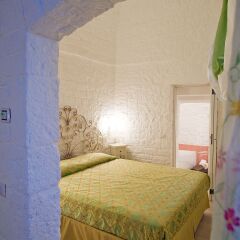 Le Alcove - Luxury Hotel nei Trulli Альберобелло комната для гостей фото 5