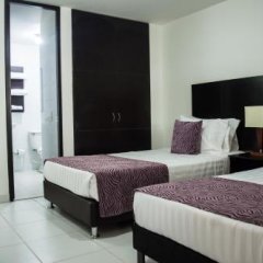 Отель ICON 48 Luxury Apartasuites Колумбия, Богота - отзывы, цены и фото номеров - забронировать отель ICON 48 Luxury Apartasuites онлайн комната для гостей фото 3