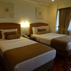 Отель City Garden Suites Manila Филиппины, Манила - 1 отзыв об отеле, цены и фото номеров - забронировать отель City Garden Suites Manila онлайн комната для гостей фото 3