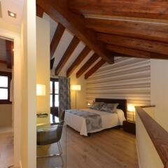 Отель Apartamentos El Palacete de Ainsa Испания, Аинса - отзывы, цены и фото номеров - забронировать отель Apartamentos El Palacete de Ainsa онлайн комната для гостей