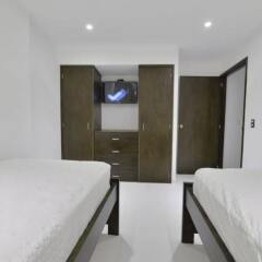 Отель Tropical Breeze Apartamentos Колумбия, Сан-Андрес - отзывы, цены и фото номеров - забронировать отель Tropical Breeze Apartamentos онлайн комната для гостей фото 4