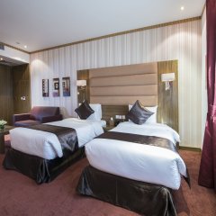 Отель Royal Tulip Hotel ОАЭ, Дубай - отзывы, цены и фото номеров - забронировать отель Royal Tulip Hotel онлайн комната для гостей фото 2