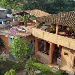 Отель Jardin Cafe Hostal & Restaurant Грасьяс