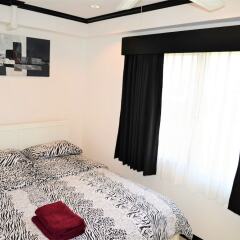 Отель Stylish 2 bed Condo Jomtien Паттайя комната для гостей