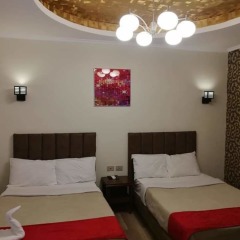 Отель Cordoba Suits сейф в номере