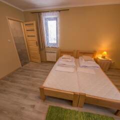Отель Pokoje i Apartamenty Nad Potokiem Закопане комната для гостей фото 3