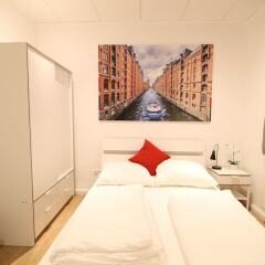 Отель Central Apartment Reeperbahn Германия, Гамбург - отзывы, цены и фото номеров - забронировать отель Central Apartment Reeperbahn онлайн комната для гостей фото 4