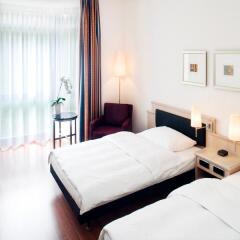 Mövenpick Hotel München-Airport комната для гостей фото 7