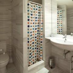 Апартаменты You Stylish Beach Apartments ванная
