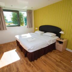 Апартаменты Ocean Serviced Apartments комната для гостей