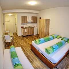 Апартаменты City Apartments Portico Меран комната для гостей фото 5