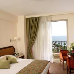 Aquamare Beach Hotel & Spa комната для гостей фото 3