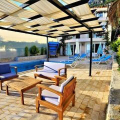 Villa Zumrut 1 by Akdenizvillam Турция, Патара - отзывы, цены и фото номеров - забронировать отель Villa Zumrut 1 by Akdenizvillam онлайн бассейн фото 3