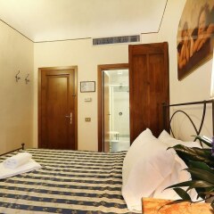 Отель Relais Il Campanile al Duomo удобства в номере