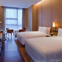 Апартаменты The Oct Harbour, Shenzhen - Marriott Executive Apartments комната для гостей фото 4