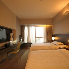 Yiwu Commatel hotel комната для гостей