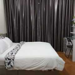 Отель Soho Suites KLCC LX Stay Малайзия, Куала-Лумпур - отзывы, цены и фото номеров - забронировать отель Soho Suites KLCC LX Stay онлайн комната для гостей