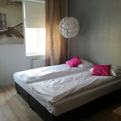 Апартаменты Novitas Apartments Вроцлав комната для гостей фото 2