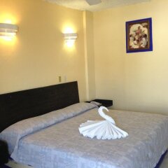 Hotel Zihuatanejo Centro комната для гостей фото 4