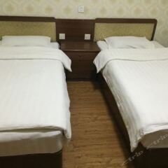 Отель Xinxinlong Inn комната для гостей
