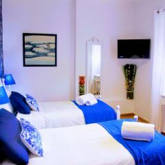 Отель Guest House Lisbon Terrace Suites II комната для гостей