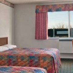 Отель Travelodge by Wyndham Winnipeg Канада, Виннипег - отзывы, цены и фото номеров - забронировать отель Travelodge by Wyndham Winnipeg онлайн комната для гостей фото 2