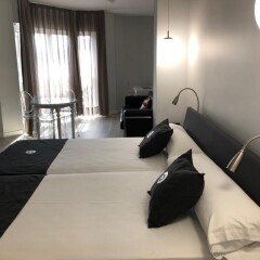 Отель Quo Eraso Aparthotel Испания, Мадрид - 9 отзывов об отеле, цены и фото номеров - забронировать отель Quo Eraso Aparthotel онлайн комната для гостей фото 2
