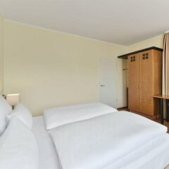 Отель Nh Muenchen City Sud Мюнхен комната для гостей фото 5