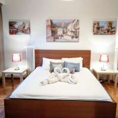 Апартаменты Acropolis museum magnificent apartment Афины комната для гостей фото 4