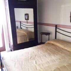 Отель B&B Villa Grassi Альберобелло сейф в номере