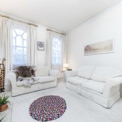Апартаменты Spacious Apartment in Trendy Islington Лондон комната для гостей фото 2