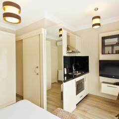 Отель Evoda Residence в номере