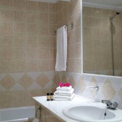 Отель Mitsis Family Village Beach Hotel Греция, Нисирос - отзывы, цены и фото номеров - забронировать отель Mitsis Family Village Beach Hotel онлайн ванная фото 2