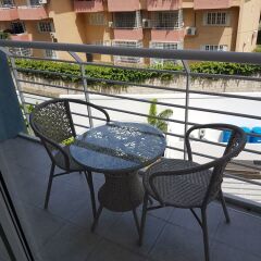 Отель Secure New Kingston Condo Ямайка, Кингстон - отзывы, цены и фото номеров - забронировать отель Secure New Kingston Condo онлайн балкон