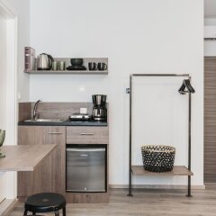 Отель Monastiraki Residences By Livin Urbban Афины удобства в номере фото 2