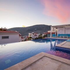 Villa Lotus by Akdenizvillam Турция, Калкан - отзывы, цены и фото номеров - забронировать отель Villa Lotus by Akdenizvillam онлайн бассейн фото 2